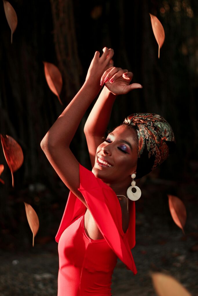 Woman raising Her Hands and dancing salsa